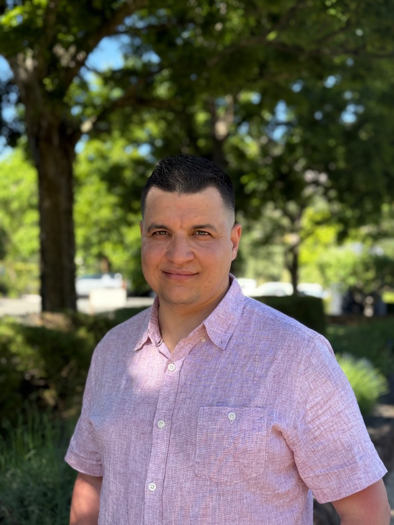 Portrait of L'Joyaux founder Juba Amrani outdoors in Napa Valley